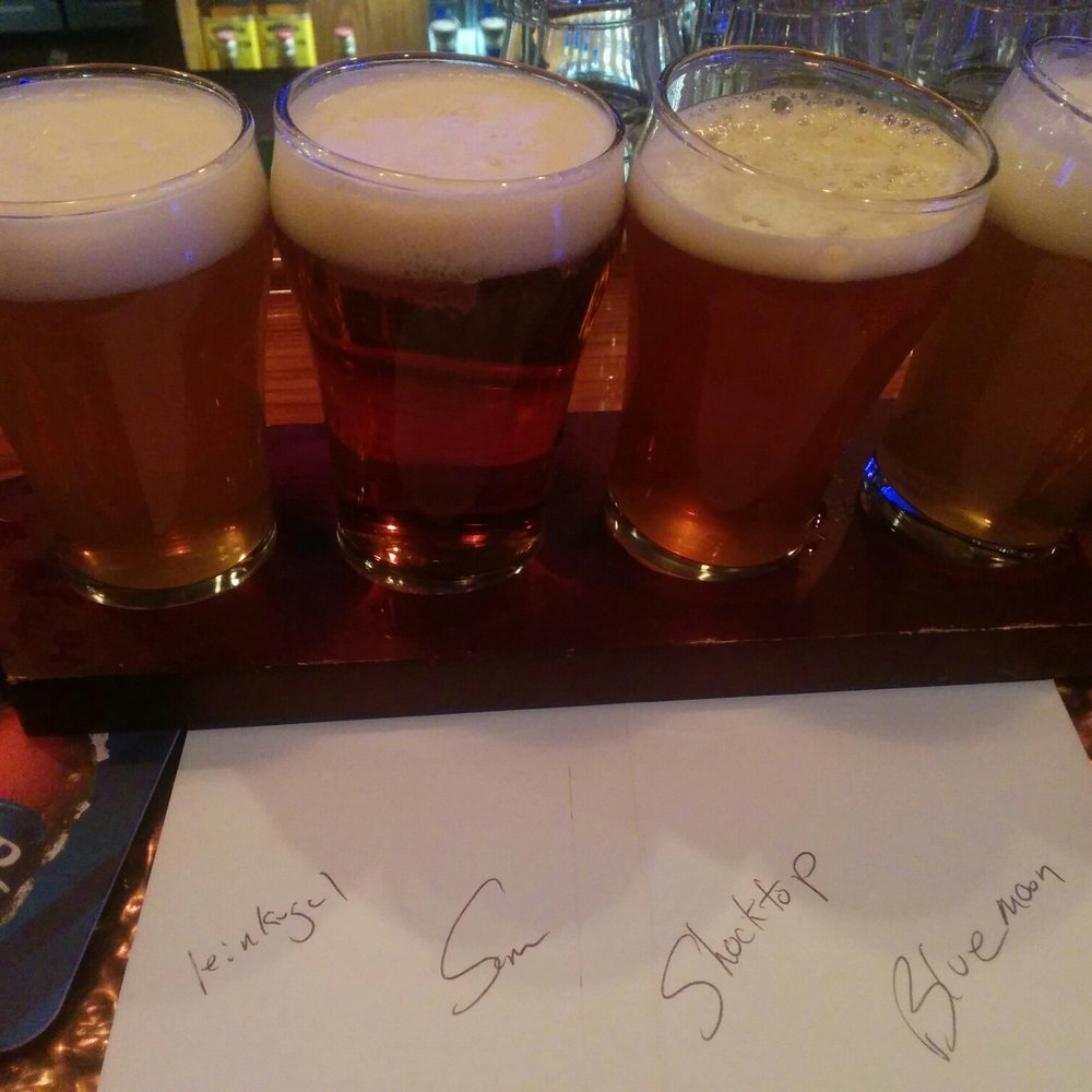 Miller's Ale House - Flight samples- they don't sit correctly, so the last tipped & fell - Sports Bars Near Me - Paramus, New Jersey