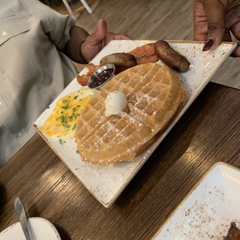 First Watch - Belgium waffles with pork sausage, bacon, scramble eggs with cheese - Breakfast & Brunch Near Me - Bowie, Maryland First Watch - Belgium waffles with pork sausage, bacon, scramble eggs with cheese - Breakfast & Brunch Near Me - Bowie, Maryland