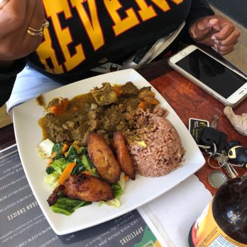 Yardy Kitchen - Curry goat - ginger beer on the side - Caribbean Near Me - Norcross, Georgia Yardy Kitchen - Curry goat - ginger beer on the side - Caribbean Near Me - Norcross, Georgia