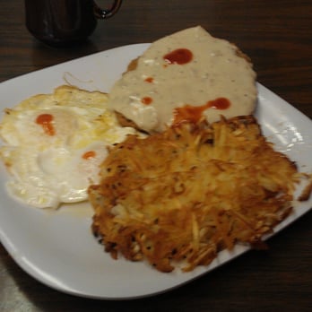 Colonel's Cafe - Chicken fried steak after I added a little hot sauce!! - American Near Me - Knoxville, Tennessee Colonel's Cafe - Chicken fried steak after I added a little hot sauce!! - American Near Me - Knoxville, Tennessee