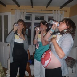 Wigan Baby showers - One of the baby shower games - baby bottle drinking game