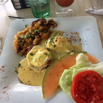The Dune Deck Cafe - A little Benedict with some major hollandaise! Sweet Jesus - Breakfast & Brunch Near Me - Lantana, Florida