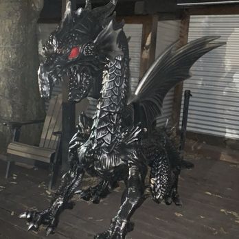 Touch of Texas - A dragon in the outdoor section for Halloween - Bars Near Me - Bunker Hill, West Virginia