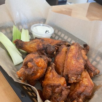 Solar Brewing Company - a basket of wings and celery - Brewpubs Near Me - Oak Island, North Carolina Solar Brewing Company - a basket of wings and celery - Brewpubs Near Me - Oak Island, North Carolina