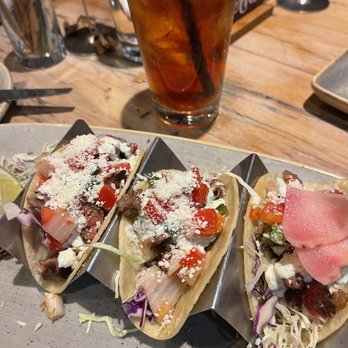 Moku Kitchen - RIBEYE STEAK TACOS | 21 spice rubbed ribeye, ma'o farm radish, salsa fresca, cilantro crema, cotija cheese, corn tortillas - Cocktail Bars Near Me - Honolulu, Hawaii Moku Kitchen - RIBEYE STEAK TACOS | 21 spice rubbed ribeye, ma'o farm radish, salsa fresca, cilantro crema, cotija cheese, corn tortillas - Cocktail Bars Near Me - Honolulu, Hawaii