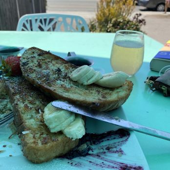 Naked Cafe - Coconut French toast - Breakfast & Brunch Near Me - Solana Beach, California Naked Cafe - Coconut French toast - Breakfast & Brunch Near Me - Solana Beach, California