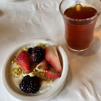 Kabul House - Rice Custard dessert topped with fresh berrries and cardamine tea - Afghan Near Me - Evanston, Illinois Kabul House - Rice Custard dessert topped with fresh berrries and cardamine tea - Afghan Near Me - Evanston, Illinois