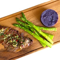 Mater - Heirloom Iberico - 
10 oz "EL SECRETO" pork skirt steak served with asparagus, purple mashed sweet potatoes & chimichurri