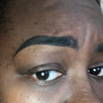 Lenox Brow & Lash Bar - You can see my brows grow clearly underneath where Van tattooed me and how uneven it looks when I change my facial expression. - Eyelash Service Near Me - Atlanta, Georgia