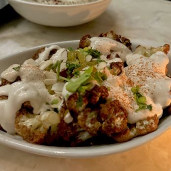 Amar Mediterranean Kitchen & Bar - Arnabeet Mekleh, Cauliflower with tahini, almonds and golden raisins - Seafood Near Me - Delray Beach, Florida