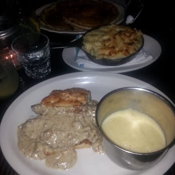 Jacob's Pickles - Sausage Gravy Smothered Chicken Biscuit Sandwich with grits and a side of Mac and cheese - Comfort Food Near Me - New York, New York