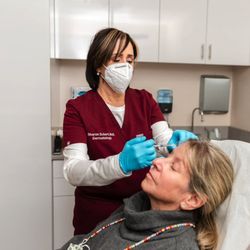 Scherl Dermatology - Dr. Scherl with a patient