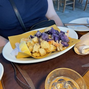 Bacaromi - Fried shrimp and calamari with purple potatoes - Italian Near Me - Venezia, VE Bacaromi - Fried shrimp and calamari with purple potatoes - Italian Near Me - Venezia, VE