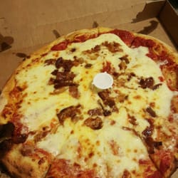 Maldini's Taste of Italy - They put all the toppings in the middle and cheese just fell off. When I called they didn't apologize or offer another pizza.