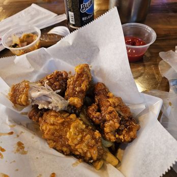 bb.q Chicken New Haven - Wings with honey garlic. Under them are crispy French fries. - Korean Near Me - New Haven, Connecticut bb.q Chicken New Haven - Wings with honey garlic. Under them are crispy French fries. - Korean Near Me - New Haven, Connecticut