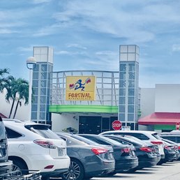 Exterior shot of entrance and parking