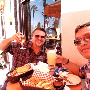 Shellback Tavern - Relaxing with outdoor dining and spring drinks at the tavern - Dive Bars Near Me - Manhattan Beach, California