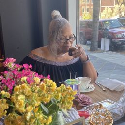 Mom smelling the aroma of the candle scent she created. Mom smelling the aroma of the candle scent she created.
