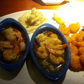 Red Lobster - The first plate. Garlic shrimp scampi (explosively bomb), Nashville hot shrimp, and mashed potatoes. Lovely. - Seafood Near Me - Riverside, California