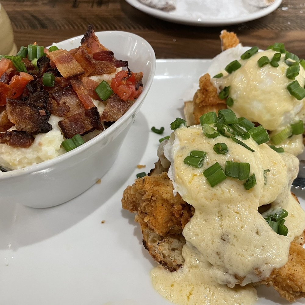 Another Broken Egg Cafe - Eggs Benedict with fried chicken and City grits - Breakfast & Brunch Near Me - Flowood, Mississippi Another Broken Egg Cafe - Eggs Benedict with fried chicken and City grits - Breakfast & Brunch Near Me - Flowood, Mississippi