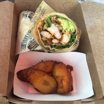 Fisherman's Cafe - Shrimp wrap with plantain side - Seafood Near Me - Key West, Florida Fisherman's Cafe - Shrimp wrap with plantain side - Seafood Near Me - Key West, Florida