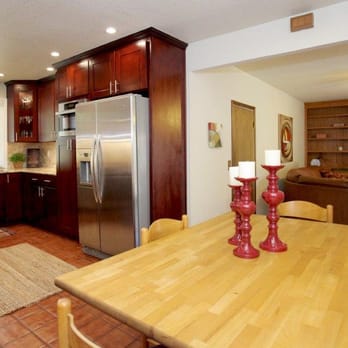 DN construction - Kitchen showing extra large KitchenAid SS refrigerator enclosure, and built-in Miele Speed Oven. - General Contractors Near Me
