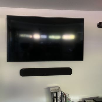 First Choice Custom Installations - Gym TV, sound bar and timer (cable box mounted behind the tv) - Security Systems Near Me First Choice Custom Installations - Gym TV, sound bar and timer (cable box mounted behind the tv) - Security Systems Near Me