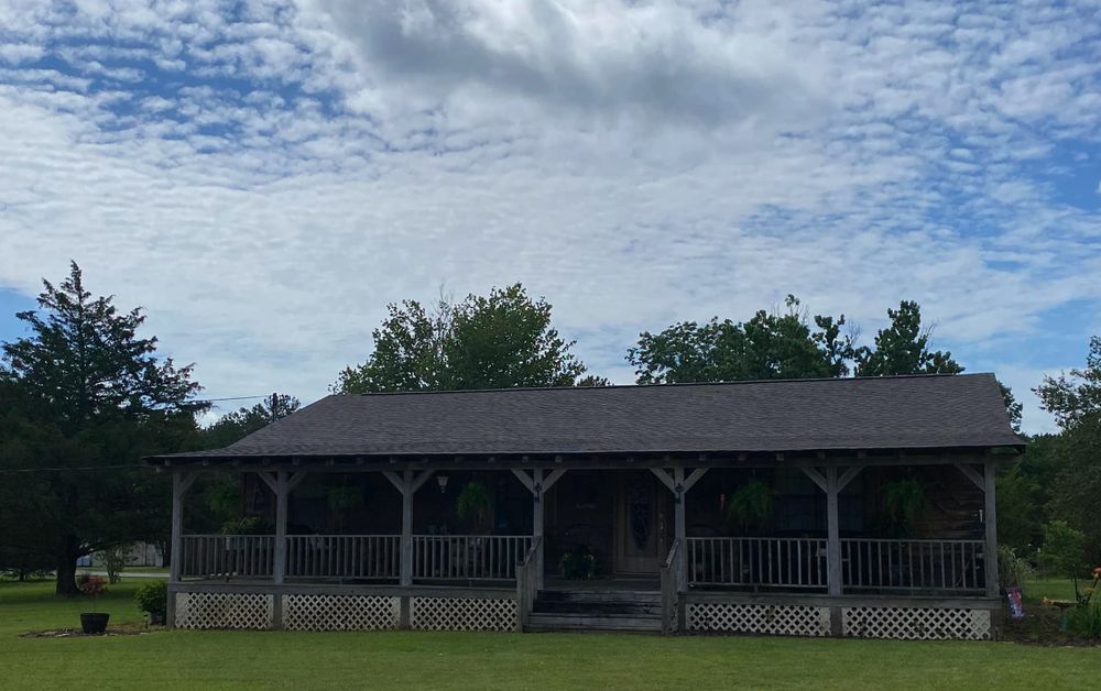 Slide of Backwoods Roofing