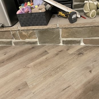 Utah Flooring & Design - The flooring goes right to all the little curves on the fireplace - Flooring Near Me - Midvale, Utah Utah Flooring & Design - The flooring goes right to all the little curves on the fireplace - Flooring Near Me - Midvale, Utah