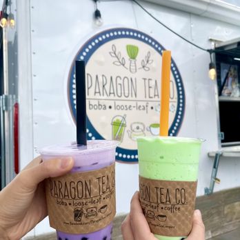 Paragon Tea Company - two people holding cups of tea - Tea Rooms Near Me - Lynchburg, Virginia Paragon Tea Company - two people holding cups of tea - Tea Rooms Near Me - Lynchburg, Virginia