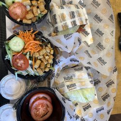 Habit Burger & Grill - Grilled Chicken on lettuce wraps with side salads.