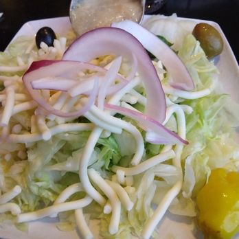 T.Arcobasso's Italian Ristorante - Dinner salad... mostly iceburg lettuce with tasty Arcobasso dressing. - Italian Near Me - Weldon Spring, Missouri T.Arcobasso's Italian Ristorante - Dinner salad... mostly iceburg lettuce with tasty Arcobasso dressing. - Italian Near Me - Weldon Spring, Missouri