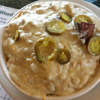 Metro Diner - This was home fries top with onions, bell pepper, jalapenos, ham, bacon,and sausage gravy - Diners Near Me - Jacksonville, Florida Metro Diner - This was home fries top with onions, bell pepper, jalapenos, ham, bacon,and sausage gravy - Diners Near Me - Jacksonville, Florida
