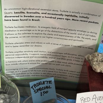 Crystal Dragon - Trolleite - A sign explains the properties of Trolleite, and a small container holds Trolleite stones labeled 'Trolleite Special 1.00'. - Jewelry Near Me - Boulder, Colorado