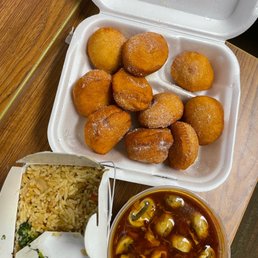 a tray of fried food and a bowl of rice