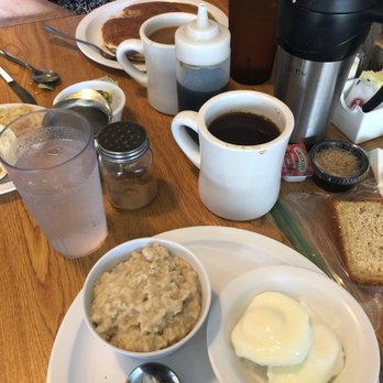 Sylvains Cafe - I get two perfect poached eggs , oatmeal and coffee. My mom has a short pancake with coffee. - Breakfast & Brunch Near Me - Deerfield Beach, Florida Sylvains Cafe - I get two perfect poached eggs , oatmeal and coffee. My mom has a short pancake with coffee. - Breakfast & Brunch Near Me - Deerfield Beach, Florida