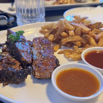 Salt & Steak - Brisket with gold flakes, fries, with 2 types of sauces. One of the sauces was ketchup-y and other was like a hot sauce. - Steakhouses Near Me - Delta, British Columbia