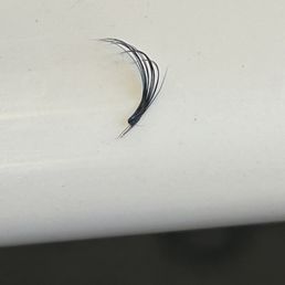 One of the many extensions stuck to 2-3 of my natural lashes. Pretty bad isolation if you ask me