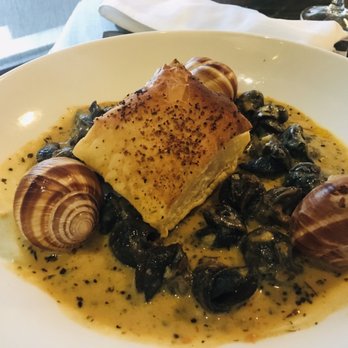 Bites & Bubbles - Escargot : sooo yummy and there were like 20+ pieces of escargot!!! Soooo delicious!!! - Wine Bars Near Me - Orlando, Florida