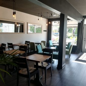 Newland Café - Inside - Coffee Roasteries Near Me - Greenfield Park, Quebec Newland Café - Inside - Coffee Roasteries Near Me - Greenfield Park, Quebec