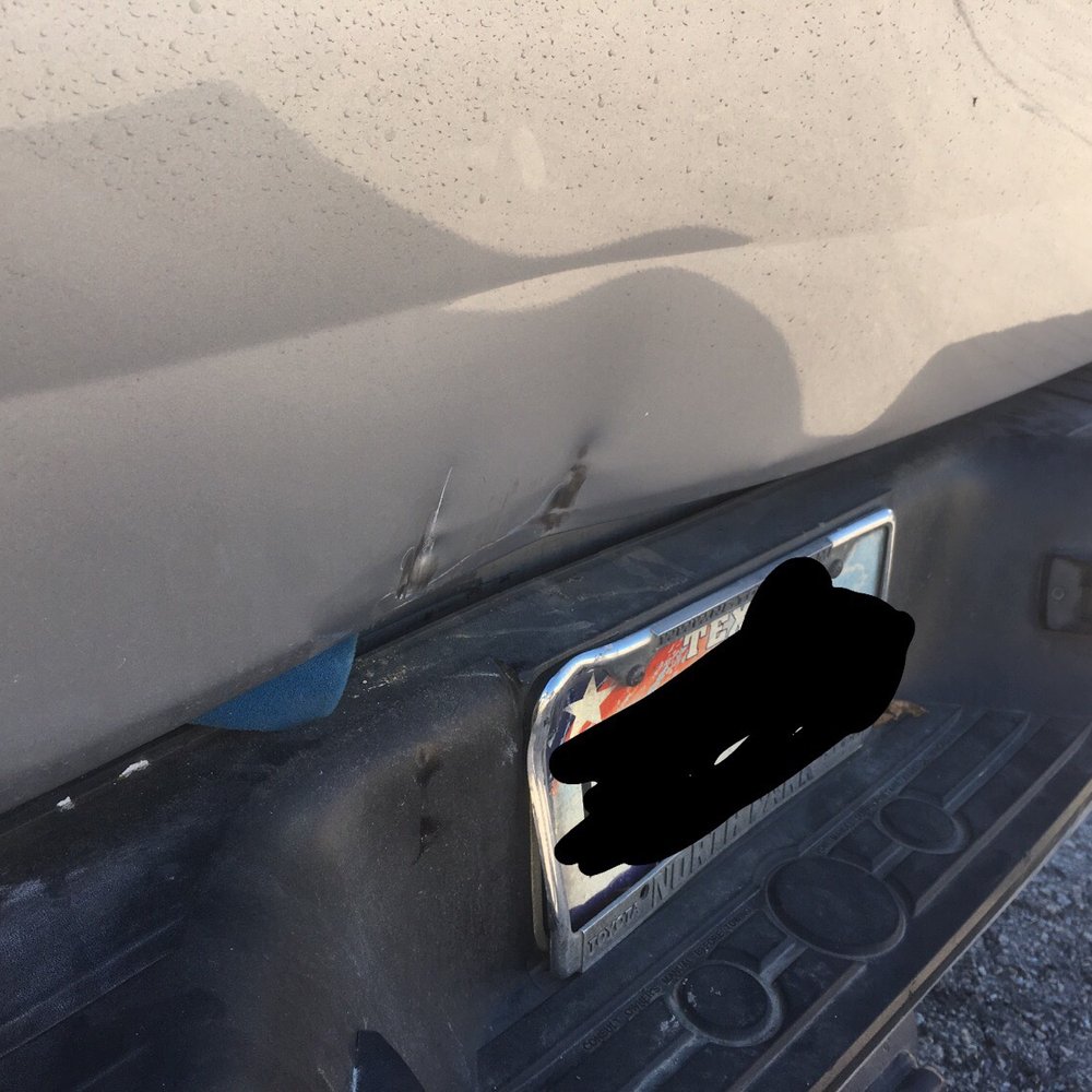 Damage to tailgate and bumper. Damage to boat and trailer not shown. Damage to tailgate and bumper. Damage to boat and trailer not shown.