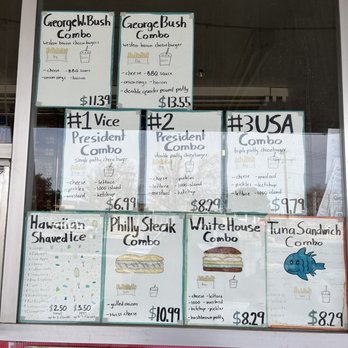 The White House - a large window with many signs on it - Burgers Near Me - Lancaster, California