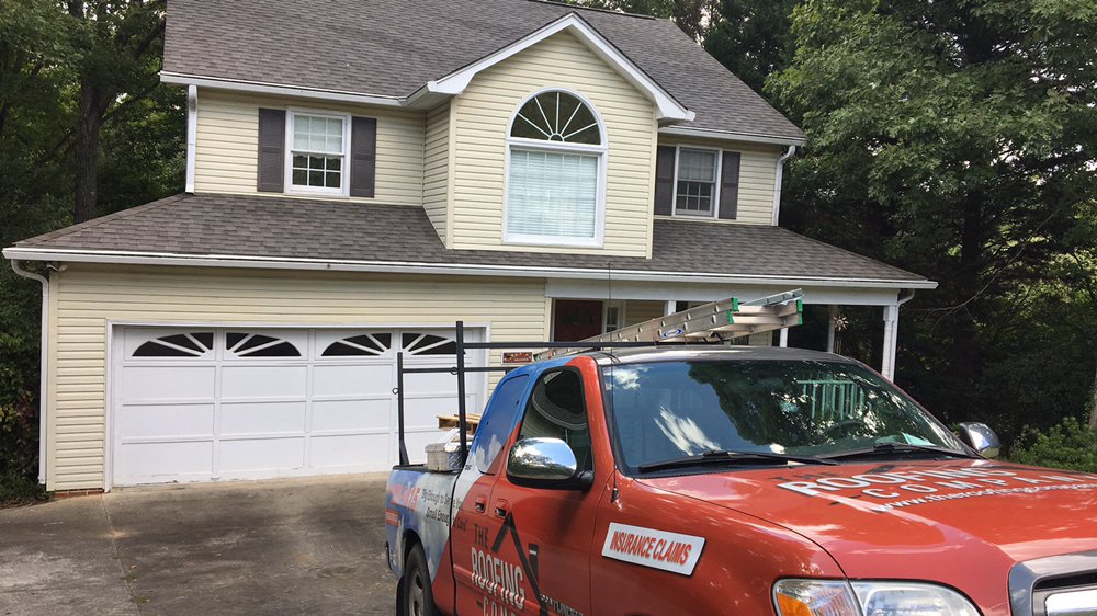 Slide of The Roofing Company