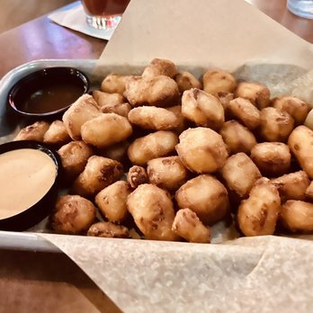 Buffalo Wild Wings - Cheese curds appetizer with Cajun ranch & caramel sauce. - Chicken Wings Near Me - Casper, Wyoming Buffalo Wild Wings - Cheese curds appetizer with Cajun ranch & caramel sauce. - Chicken Wings Near Me - Casper, Wyoming