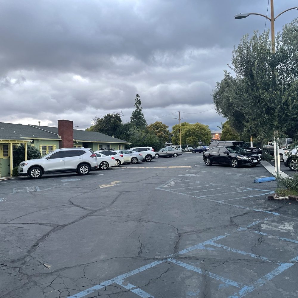 Vince's Spaghetti - One area of the front parking area. And orignal family house - Italian Near Me - Ontario, California
