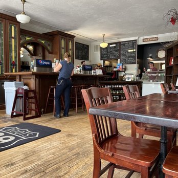 Roots 89 Grill - a woman standing at the bar - Burgers Near Me - Spring City, Utah