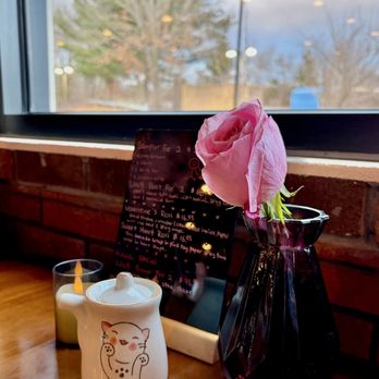 Fuji - Special offers on the table with real flowers and good soy in the cute Kitty condiment jar. - Sushi Bars Near Me - Woonsocket, Rhode Island