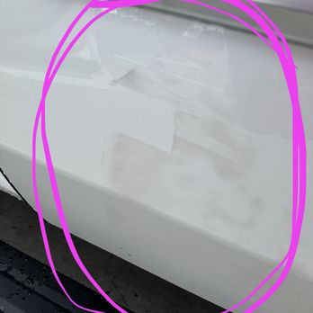 Euro American Collision Center - Overspray tape marks after paint was completed. - Body Shops Near Me - Costa Mesa, California