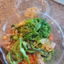 Salmon and yellowtail poke with hawaiian sauce.  All the fixins