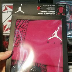 Sterling Mills - So cute! Nike Jordan baby gifts. Socks, hat and baby grow. X